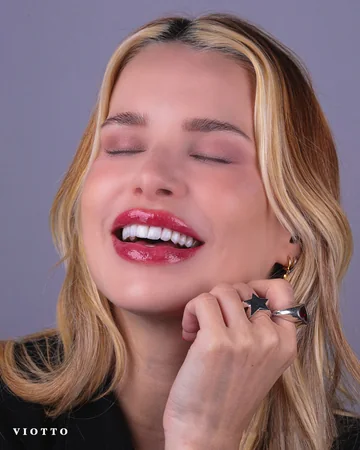 Sorriso de paciente da Clínica Viotto