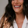 Sorriso de paciente da Clínica Viotto