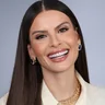Sorriso de paciente da Clínica Viotto